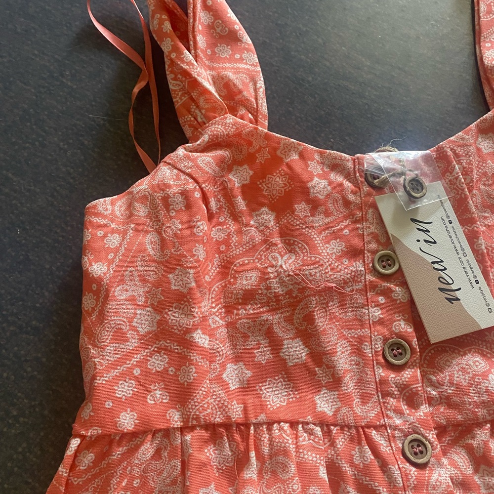 NWT! Pink romper from Pink Lily. Never worn.